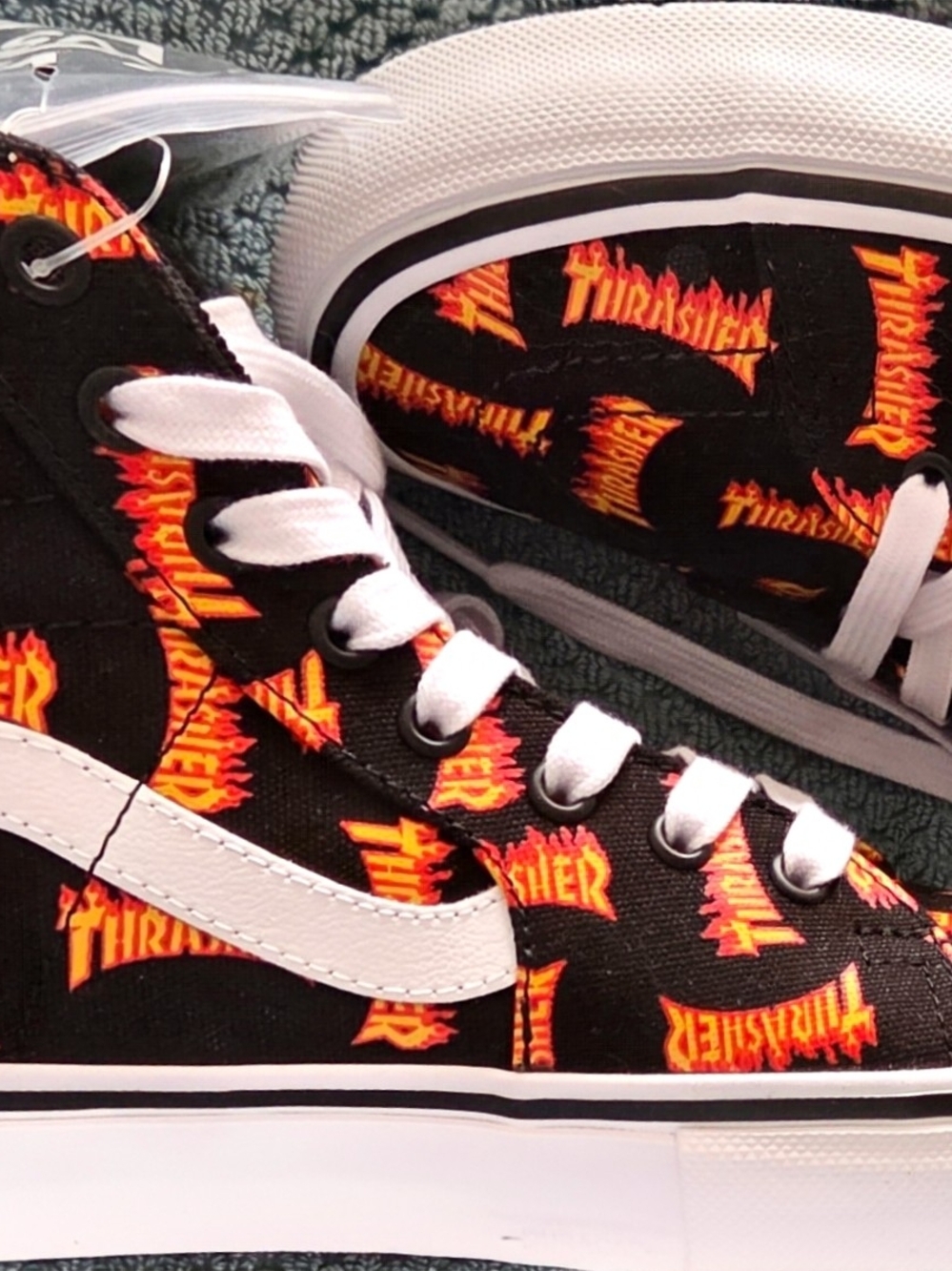 Vans Black High-Top Sneakers with Orange Flame Logo